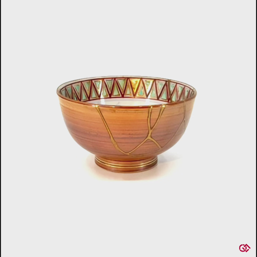 Embrace the beauty of brokenness: This rotating video of an authentic Kintsugi pottery invites you to discover the captivating elegance of flaws transformed into art.