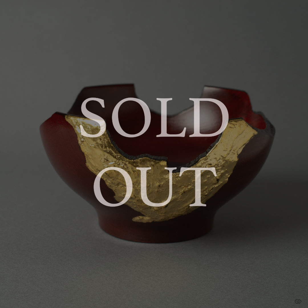 Sold: A Japanese lacquerware piece inspired by the Kintsugi philosophy, featuring elegant gold leaf decoration that celebrates the beauty of form.