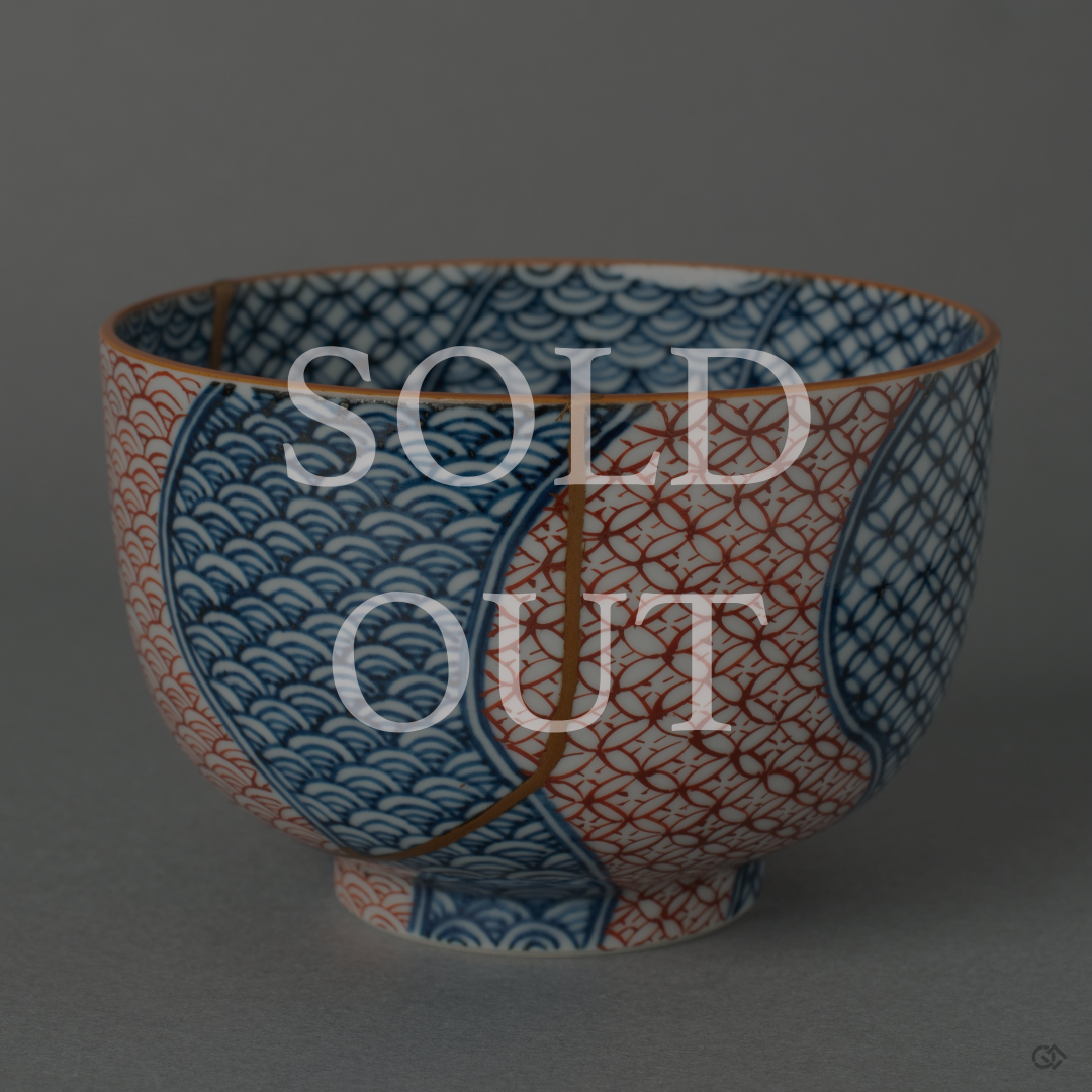 Handcrafted Kintsugi art piece with 24K golden seams, labeled sold out.