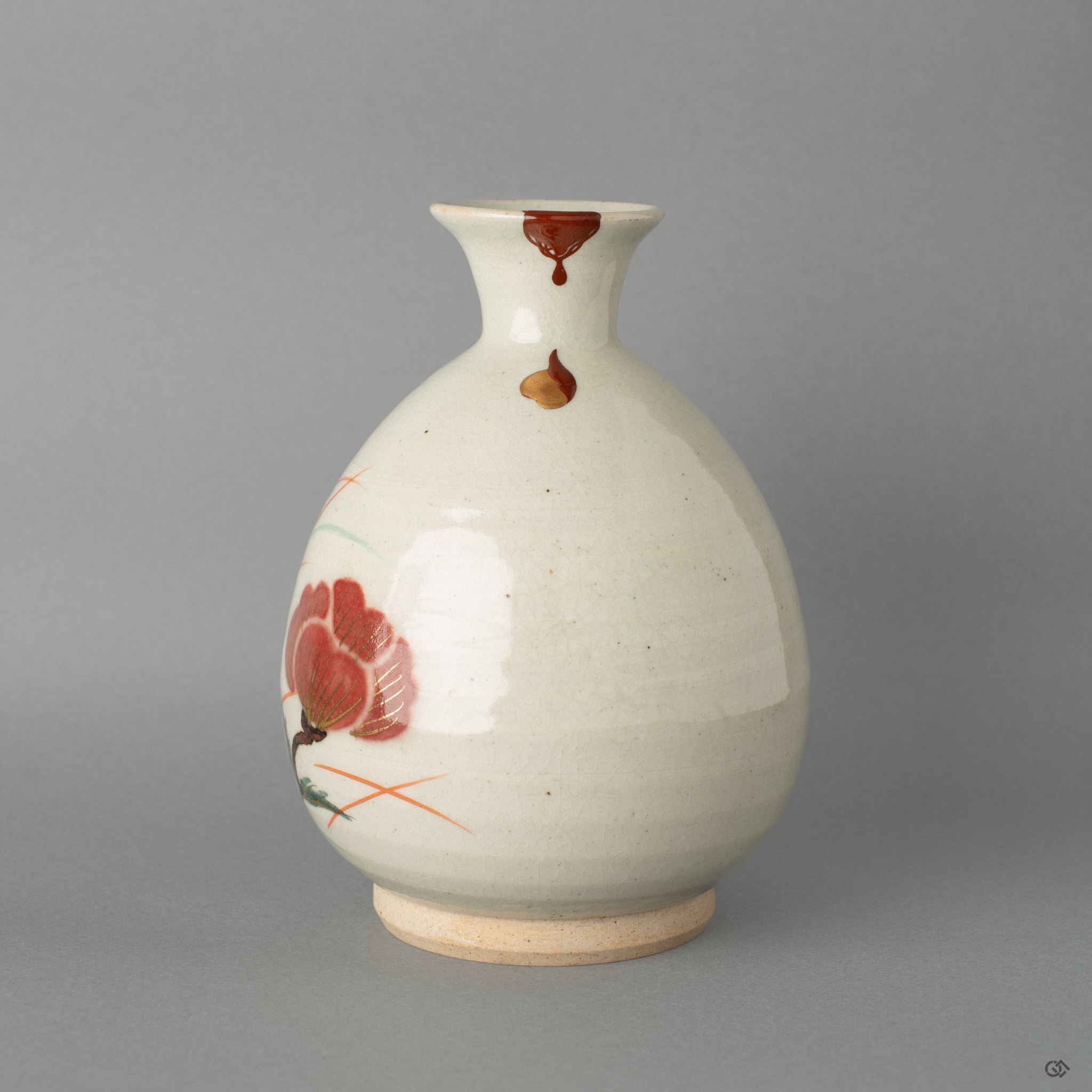 Front view of Kyoto ware tokkuri restored with vermilion iro-urushitsugi kintsugi and 24k gold maki-e, a legacy piece.