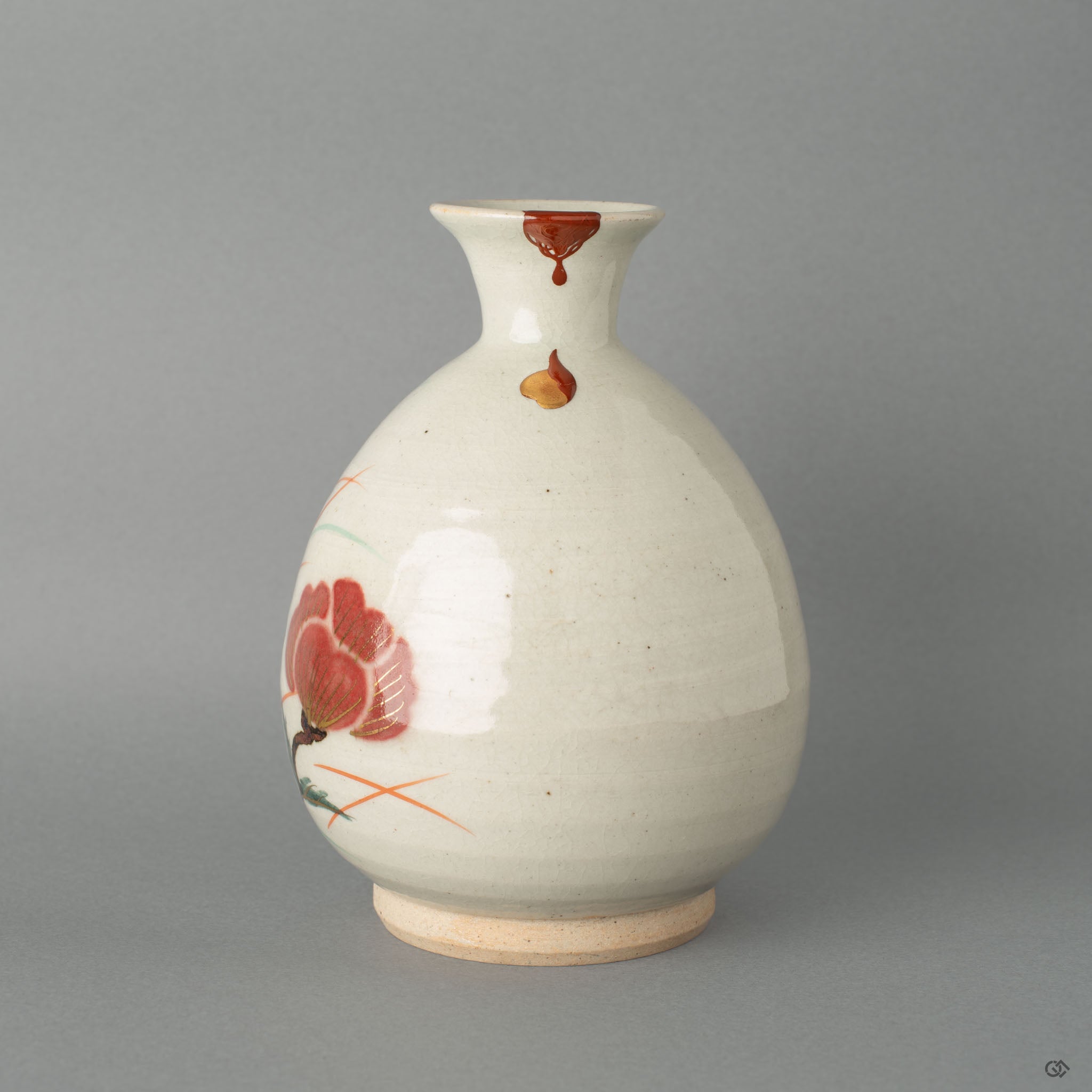 Front view of Kyoto ware tokkuri restored with vermilion iro-urushitsugi kintsugi and 24k gold maki-e, a legacy piece.