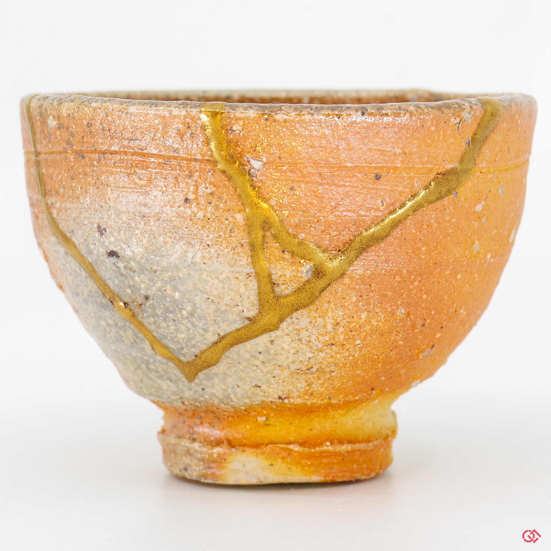 Detailed view of authentic Kintsugi repair, showcasing craftsmanship and gold inlay.