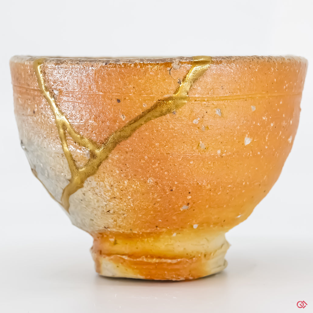 Up-close look at authentic Kintsugi pottery, highlighting intricate details.