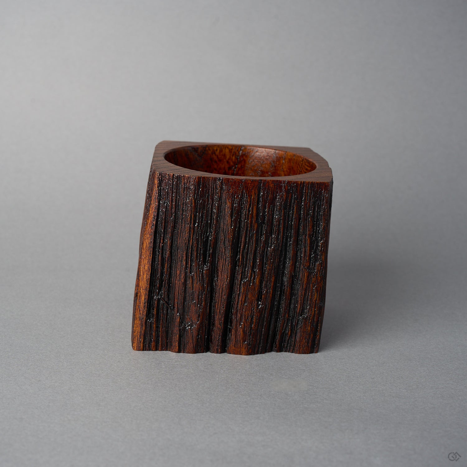 Back view of KODAMA Nashiji by Nobuyasu Suginaka, showing the rough vertical grain and weathered bark texture of the century-old wood around the bowl opening.