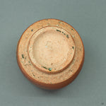 The unglazed foot (koudai) of the Shigaraki tea cup, showing  the natural, earthy texture of the clay from one of Japan's Six Ancient Kilns.