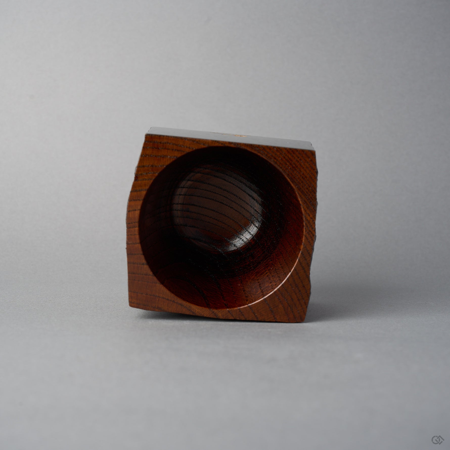 Top view of KODAMA Black Roiro, looking down into the smoothly hollowed bowl with its glossy wood-grain interior.