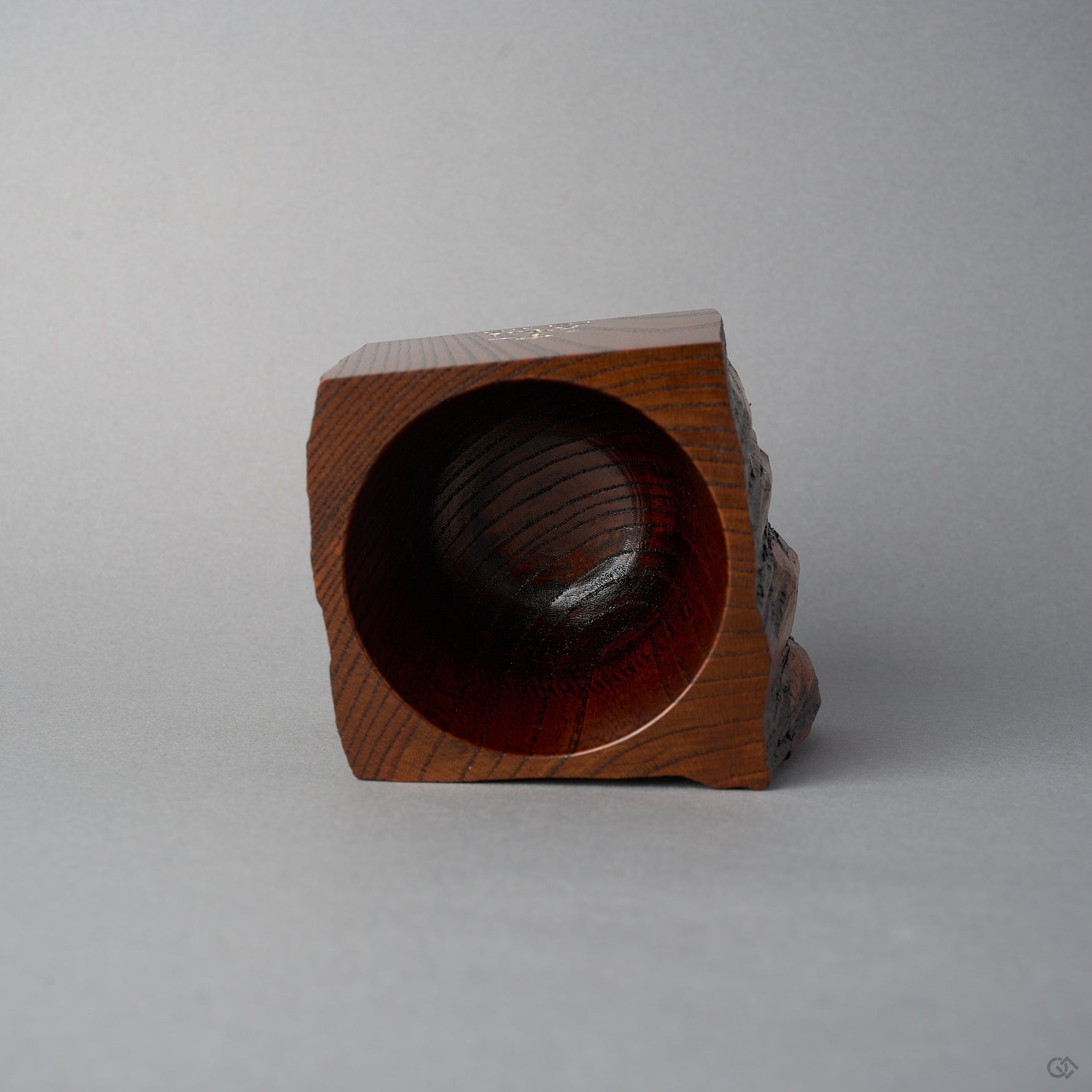 Top view of KODAMA Fuki-urushi, looking down into the smoothly hollowed bowl with its glossy keyaki-grain interior.