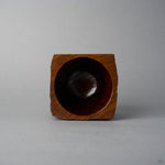 Top view of KODAMA Nashiji, looking down into the smoothly hollowed bowl with its glossy reddish wood-grain interior.