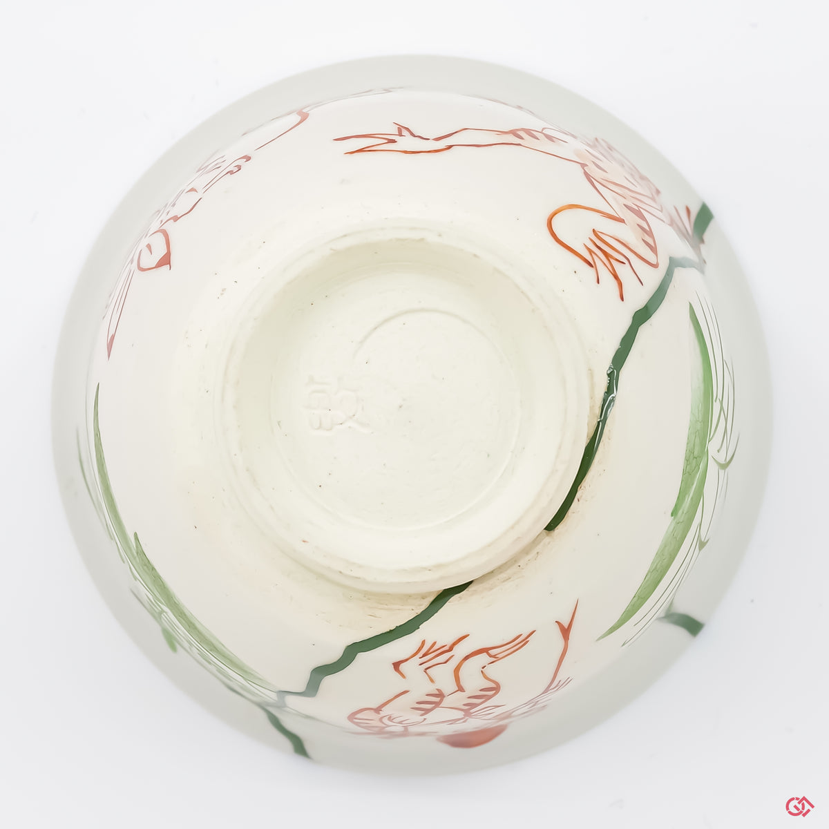Photo of the bottom side of an authentic Kintsugi pottery, showing its overall design and features.