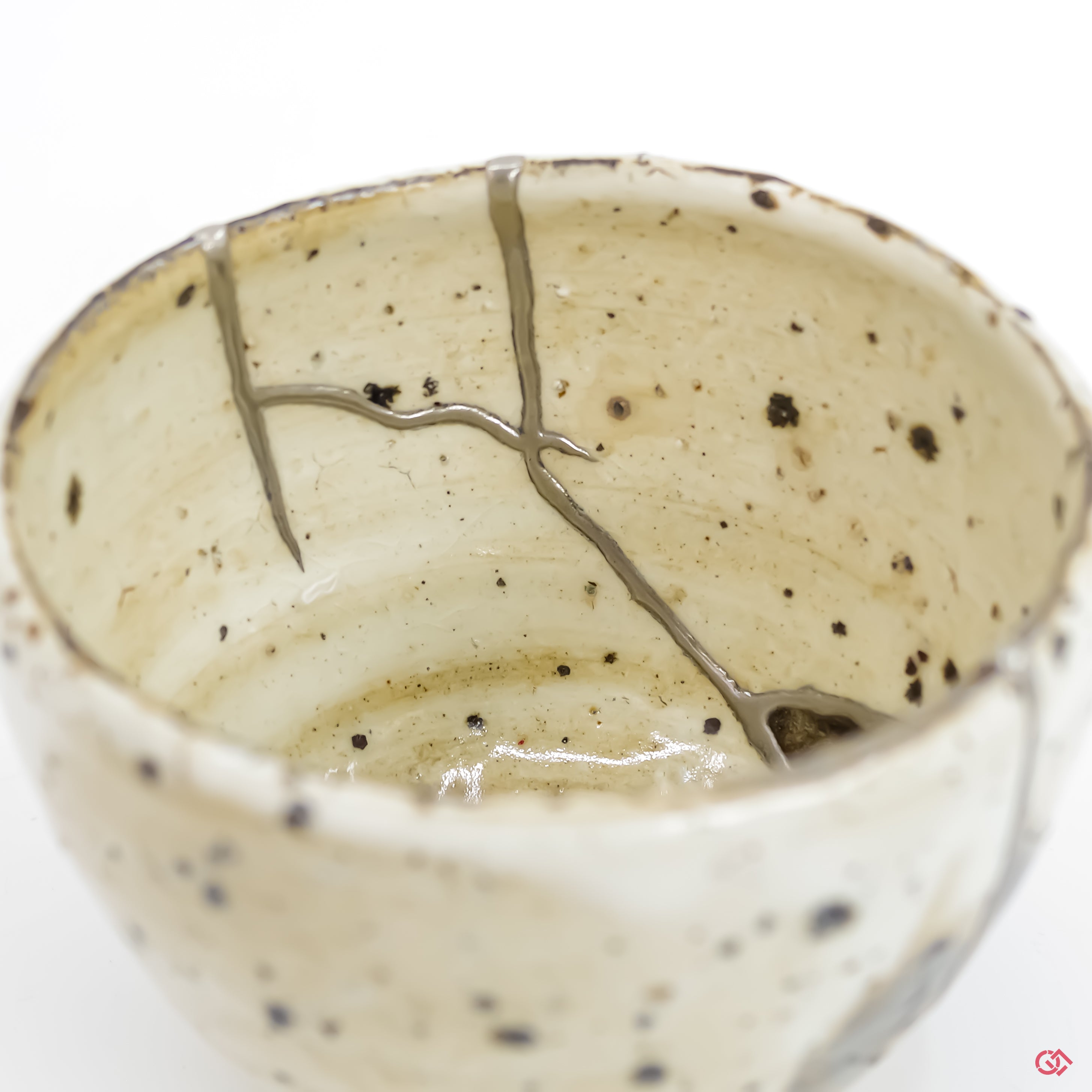 Up-close look at authentic Kintsugi pottery, highlighting intricate details.