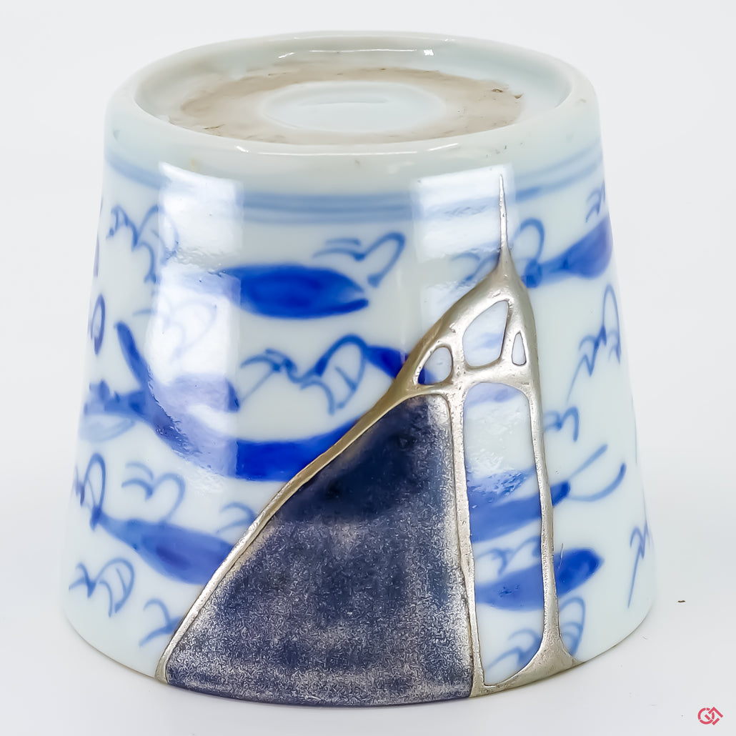 Up-close look at authentic Kintsugi pottery, highlighting intricate details.