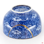 Buy the Japanese art of Kintsugi up close: Witness the delicate brushstrokes of gold that transform imperfection into beauty.