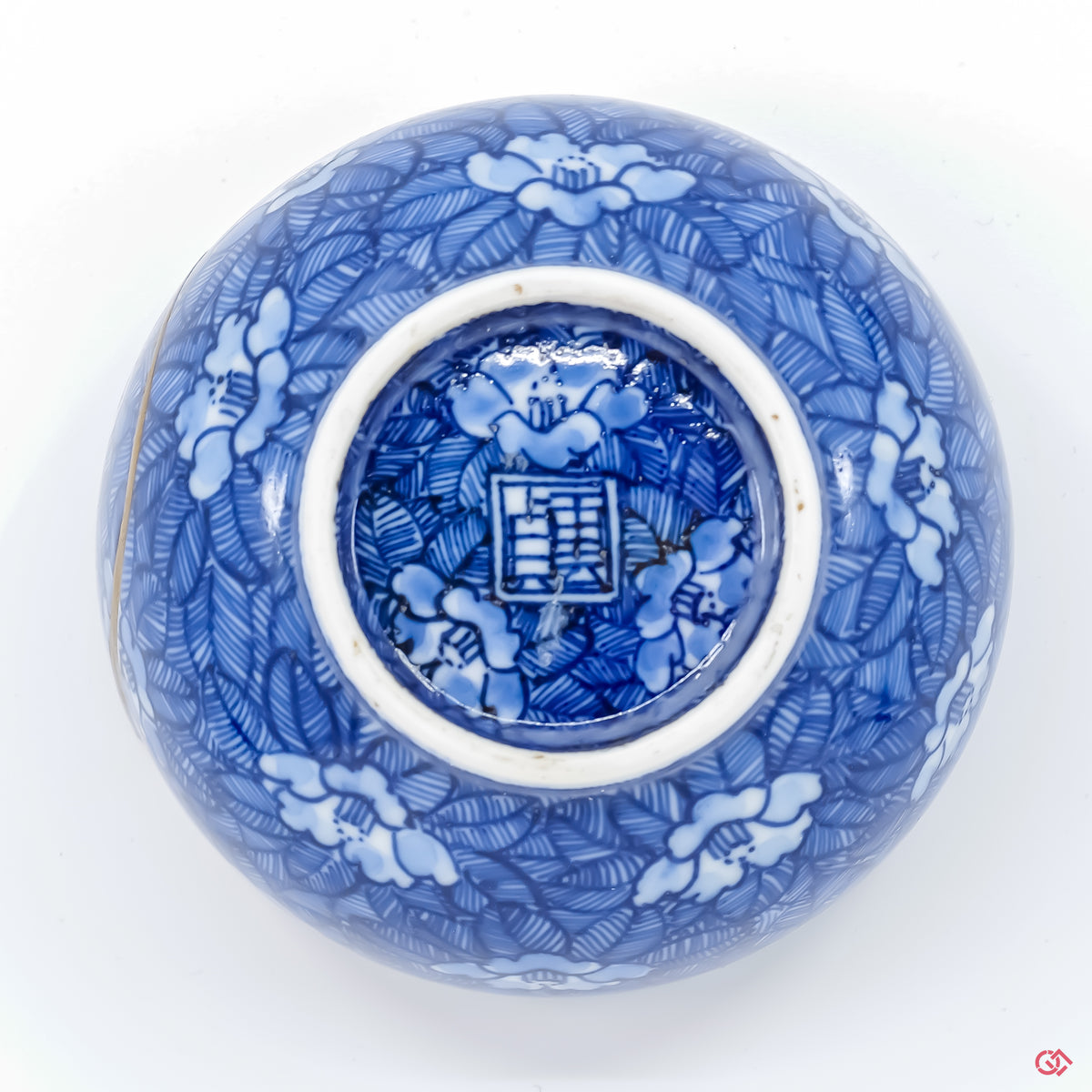 Photo of the bottom side of an authentic Kintsugi pottery, showing its overall design and features