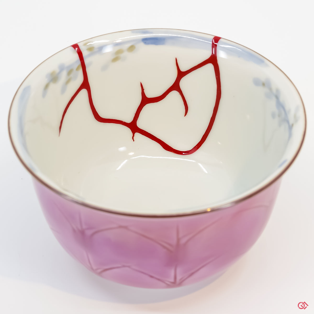 Buy the Japanese art of Kintsugi up close: Witness the delicate brushstrokes of gold that transform imperfection into beauty.