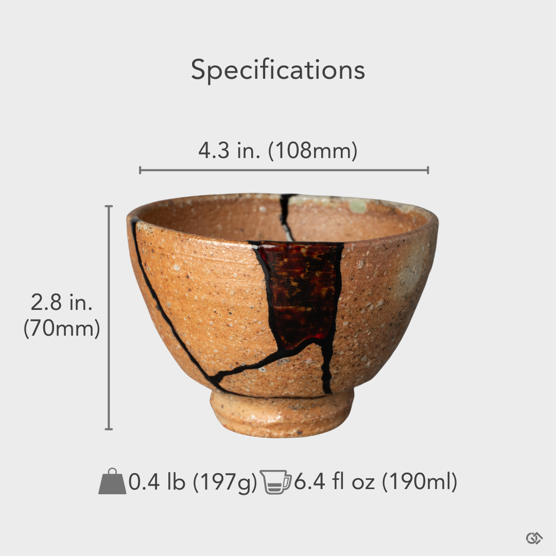 A size-reference view of the artistic kintsugi cup, its balanced proportions a physical vessel for a profound philosophy in form.