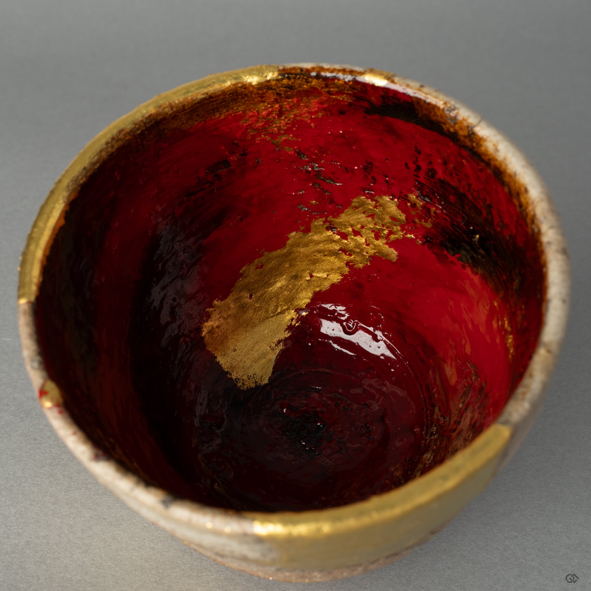 A macro view of the deep, textured yakitsuke-urushi finish, showcasing the profound beauty and skill inherent in the art of urushi lacquer.