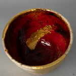 A macro view of the deep, textured yakitsuke-urushi finish, showcasing the profound beauty and skill inherent in the art of urushi lacquer.