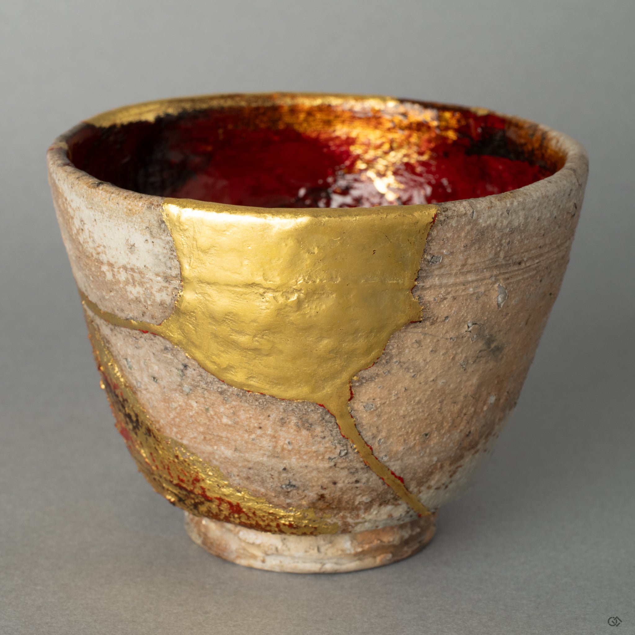 The golden repair on this Shigaraki cups rustic surface, a profound and beautiful expression of scars as beauty and the philosophy of care.