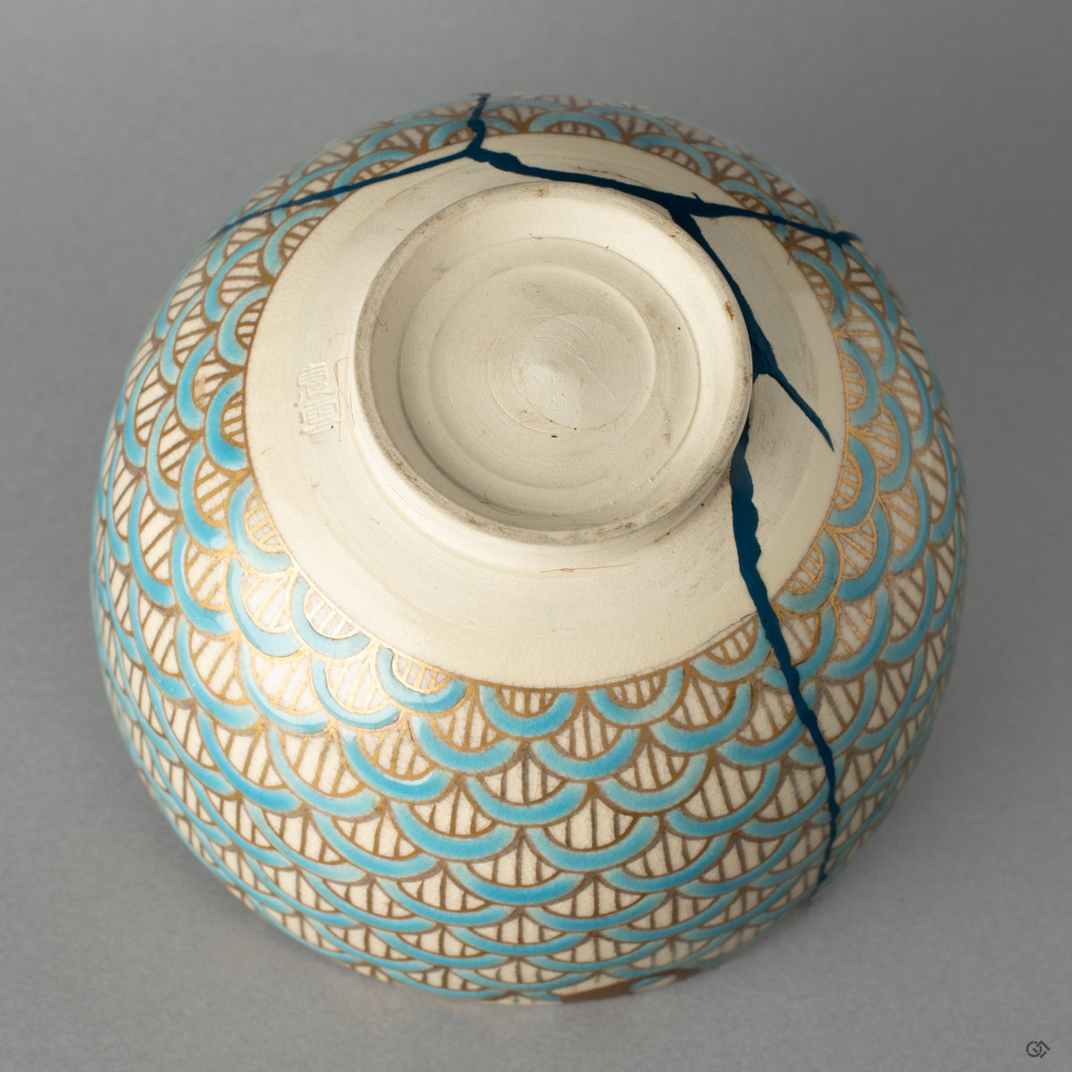 Bottom view of the Kyoto ware matcha bowl, revealing its heritage and the artisans mark—a tangible piece of Japanese philosophy.