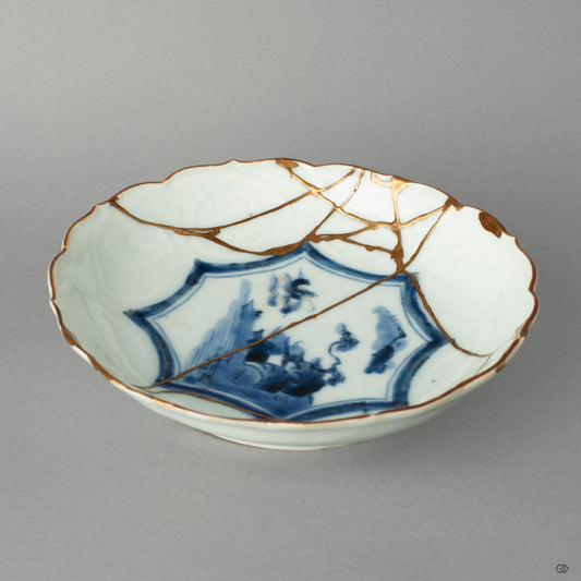 Front view of an antique Ko-Imari bowl, revived with 24K gold and iro-urushi kintsugi, giving this treasured heirloom a new story to tell.