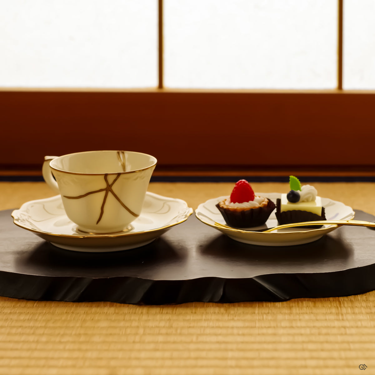 An authentic Japanese Kintsugi Cup & Saucer repaired with 24K Gold artistry, revealing the harmony between the original form and its golden seams.
