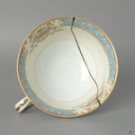 A top-down view into the Art Deco Noritake kintsugi cup, its golden seam inviting a moment of contemplation with every sip.