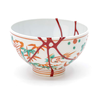 Authentic kintsugi Kyoto ware teacup with colorful aka-e bird and floral painting and vermilion urushi repair — breathtaking craftsmanship praised by a returning customer from Dublin Ireland.