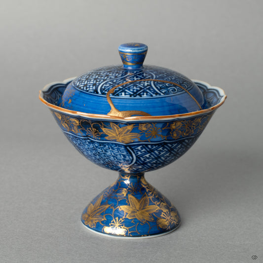 Front view of a Kyoto ware lidded cup, thoughtfully restored with 24K gold and iro-urushi kintsugi, giving this heirloom a new story to tell.