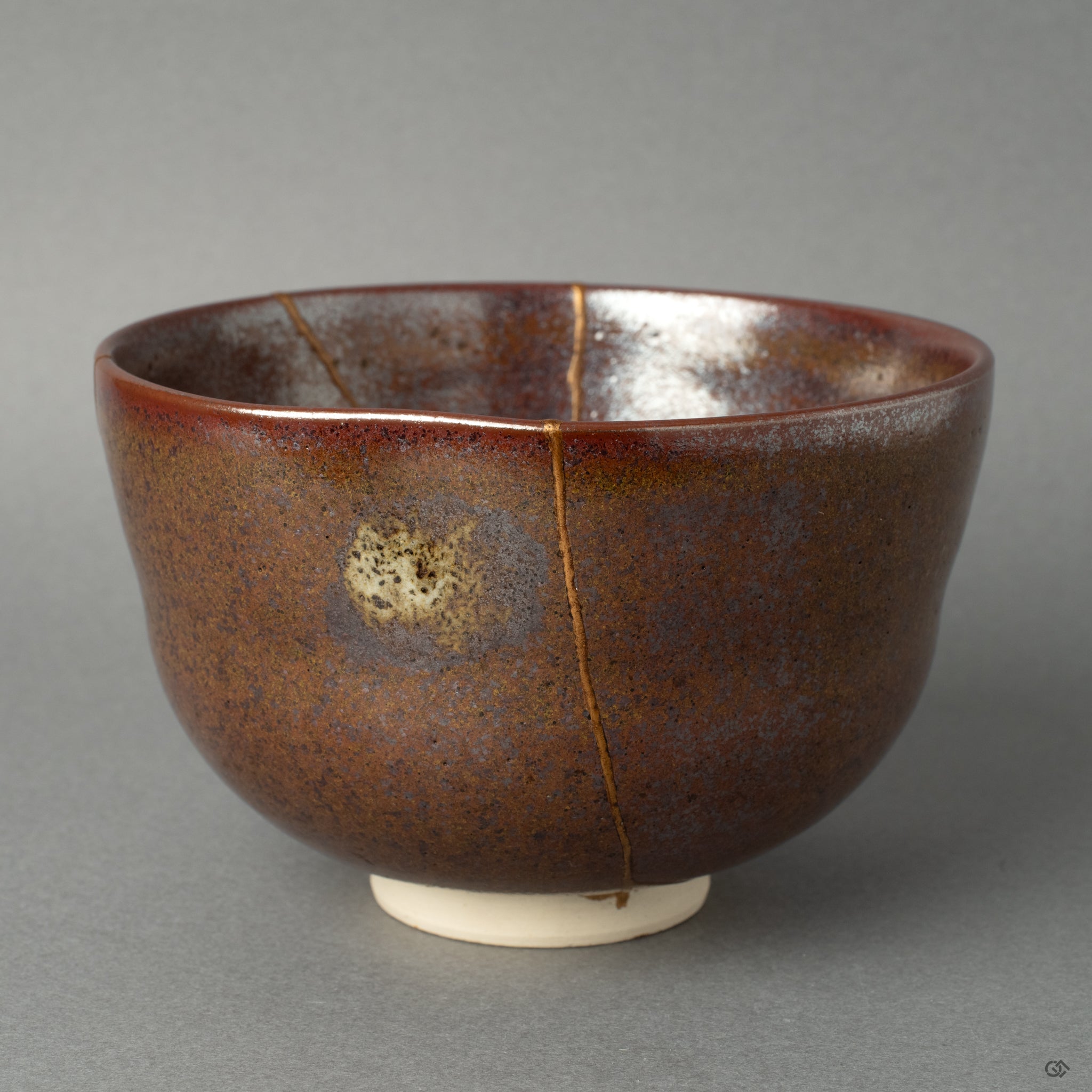 A different side view of the Kyoto ware bowl, its delicate kintsugi mend an act of honoring history and the vessels past life.