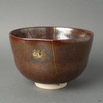 A different side view of the Kyoto ware bowl, its delicate kintsugi mend an act of honoring history and the vessels past life.