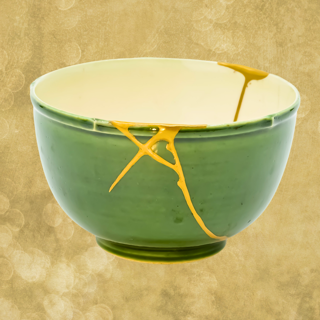 Authentic Japanese Kintsugi: Broken pottery restored with gold, embodying Wabi-Sabi philosophy.