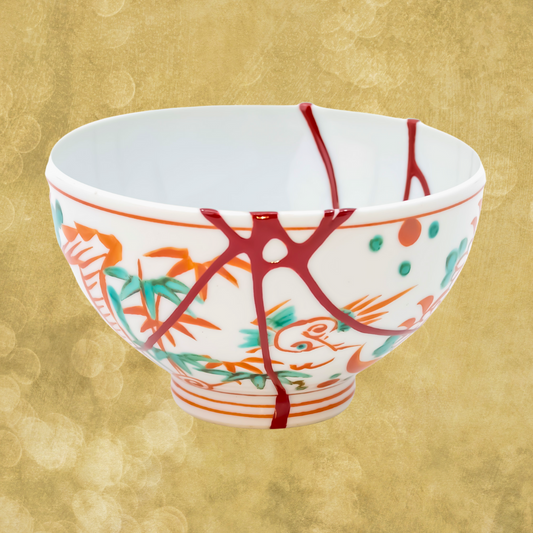 Discover the beauty of Kintsugi: Handcrafted Japanese pottery repaired with colored urushi lacquer, embodying Wabi-Sabi.