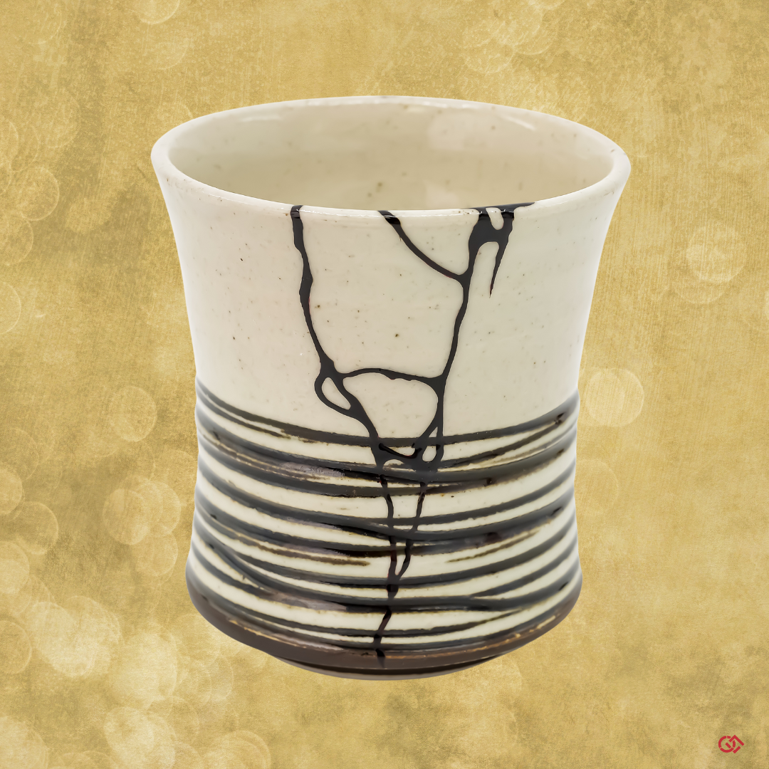 Discover the beauty of Kintsugi: Handcrafted Japanese pottery repaired with colored urushi lacquer, embodying Wabi-Sabi.