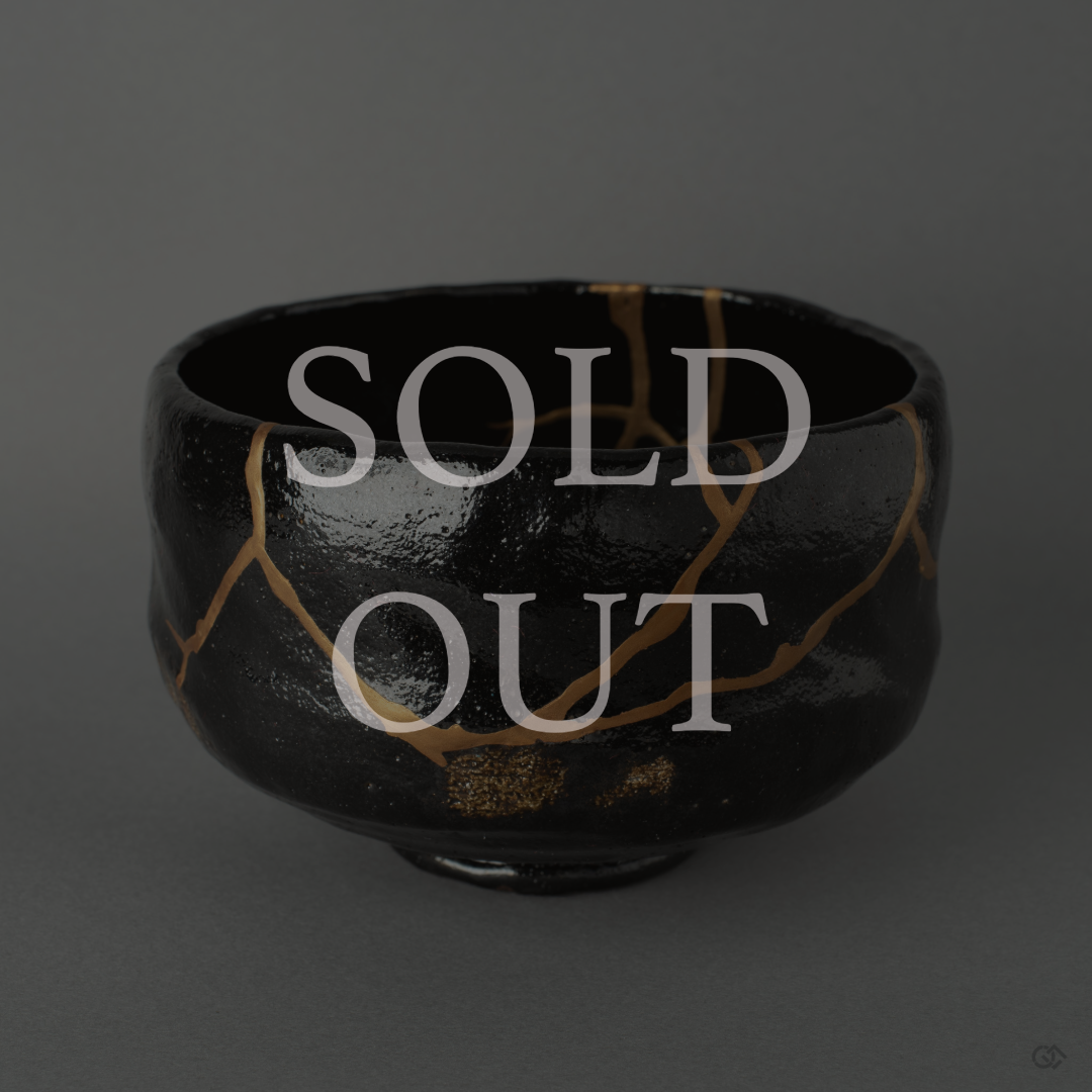 Black Kyoto matcha bowl restored with 24K gold Kintsugi, radiating quiet elegance — sold out.