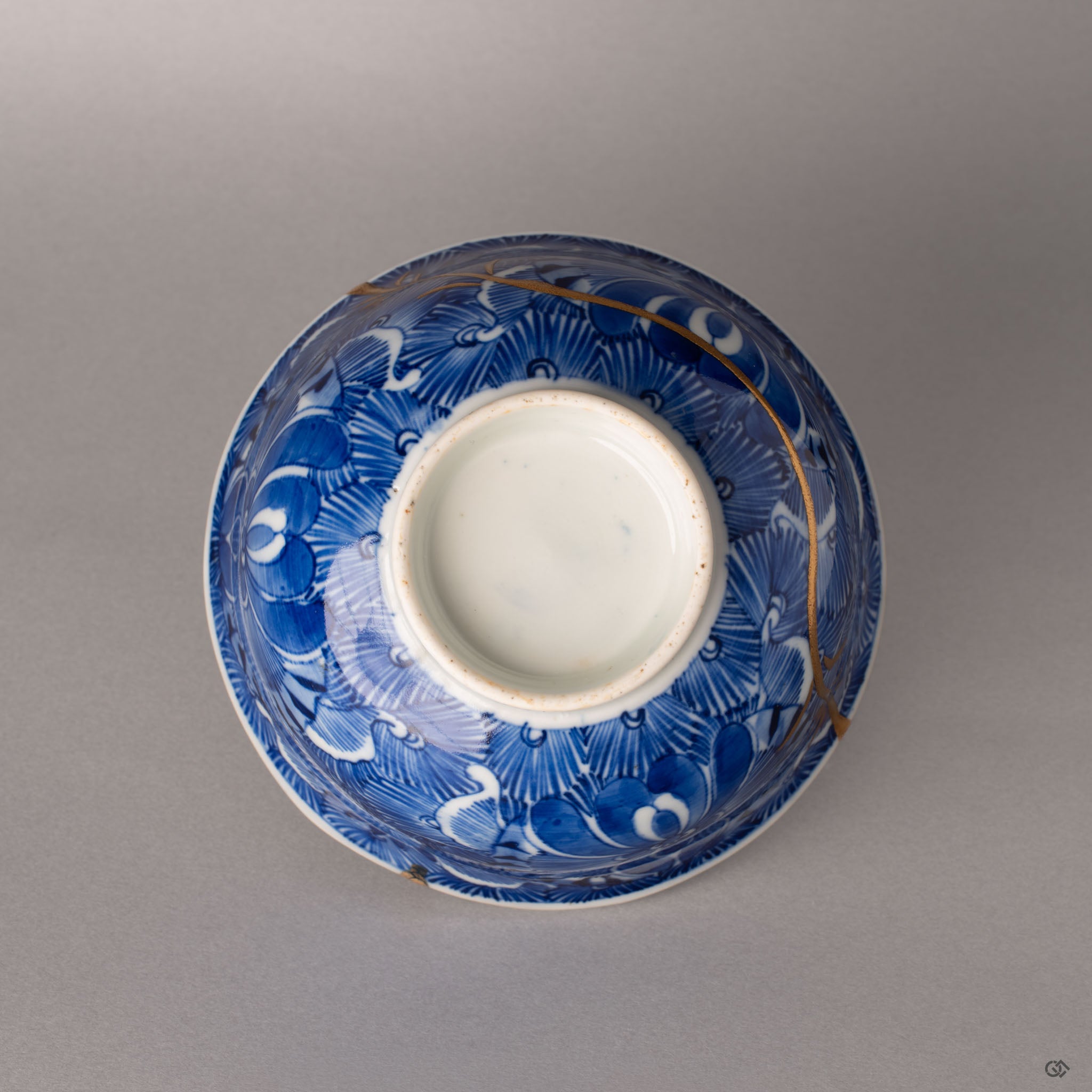 Bottom of a Ko-Imari kintsugi bowl showing the unglazed foot ring and maker marks, authentic Japanese kintsugi.
