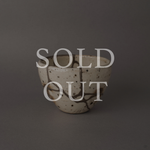 Sold out: Silver kintsugi Shigaraki earthenware cup with branching silver seams on ivory white surface