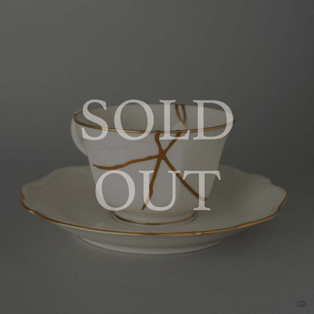 Authentic Japanese Kintsugi cup and saucer, hand repaired by a nationally certified lacquer artisan with urushi and 24K gold, marked sold out.