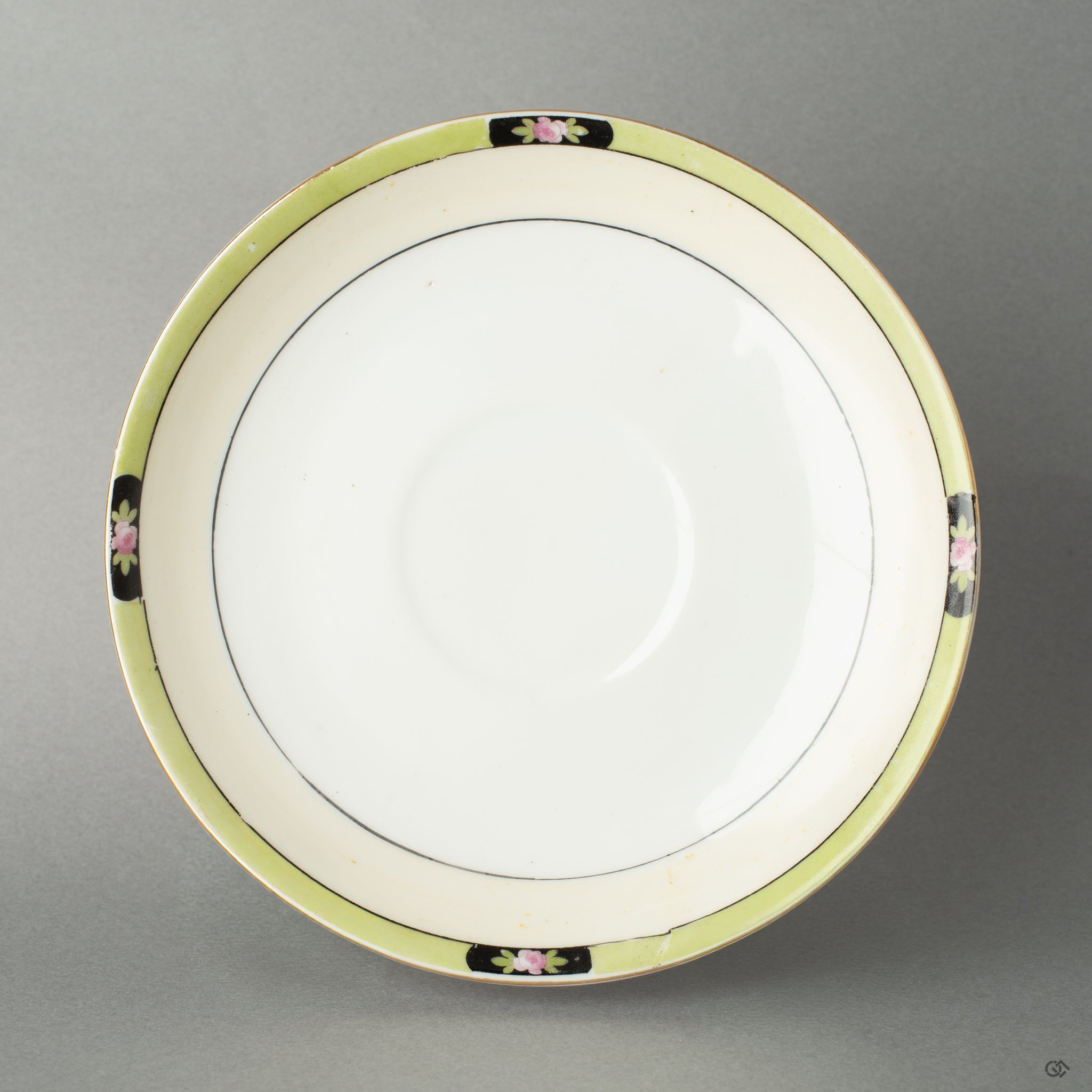 Top view of a Noritake saucer mended with kintsugi—celebrating a second life through enduring Japanese craftsmanship.