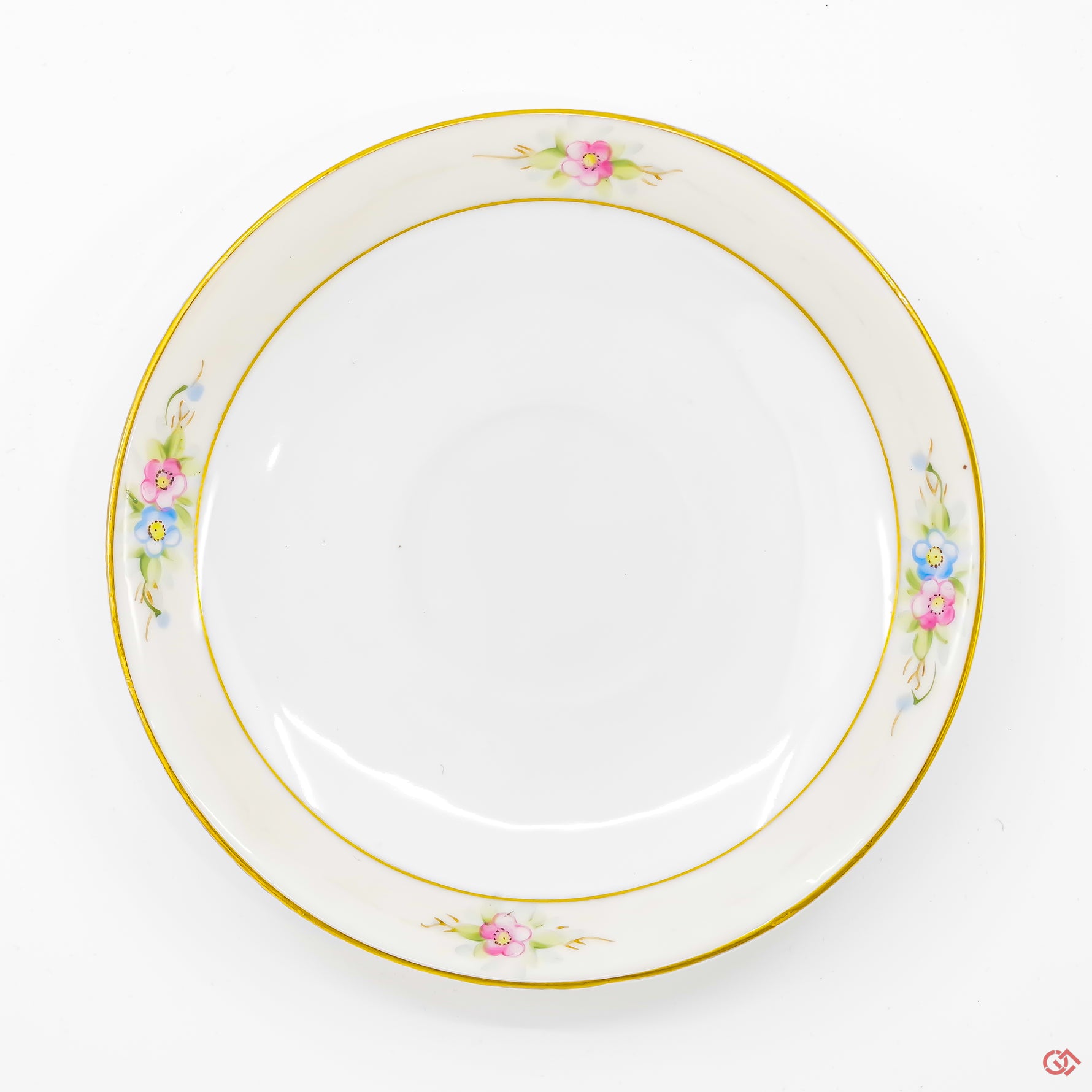 A photo of the bottom of an authentic Kintsugi pottery piece, showing its overall design and features.