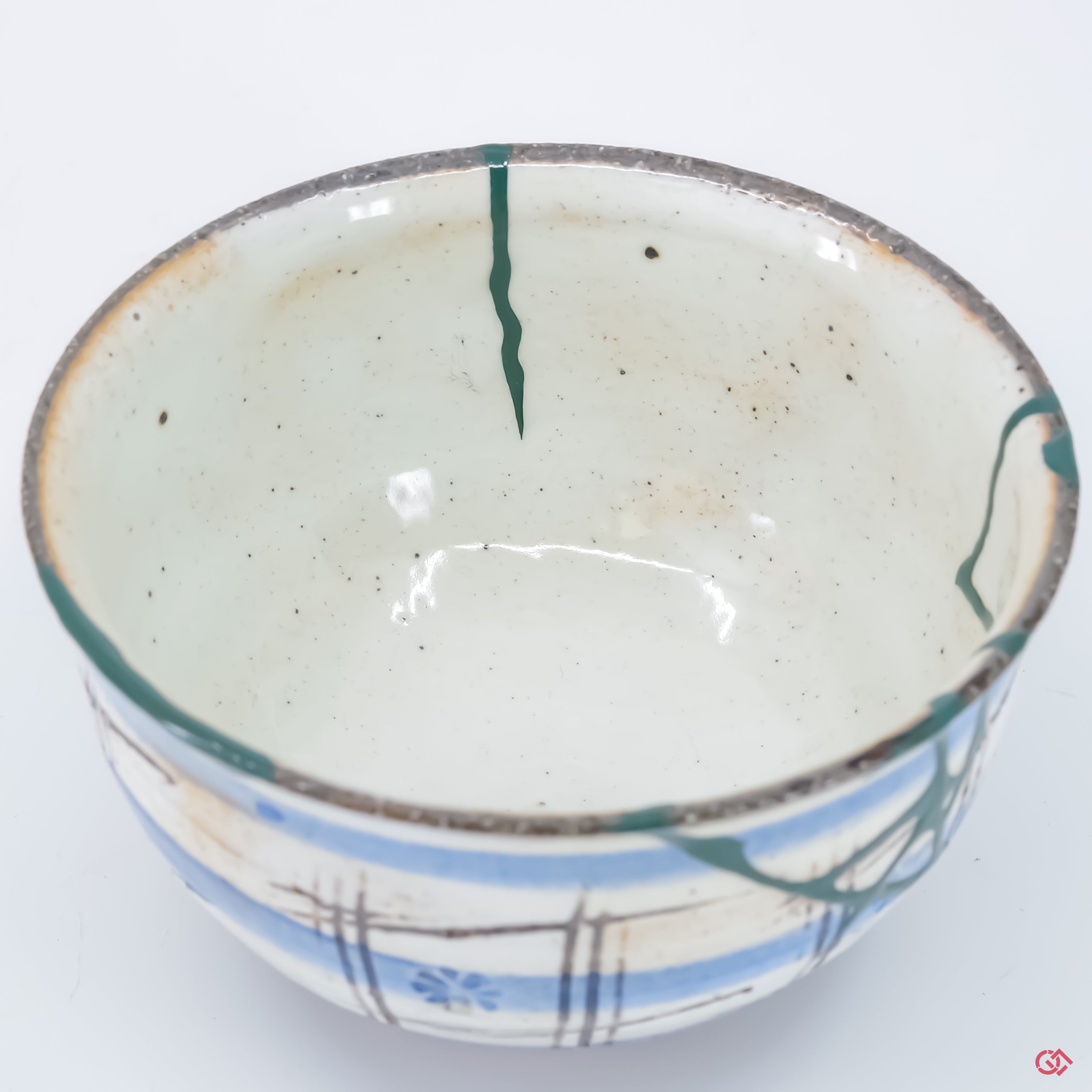 Up-close look at authentic Kintsugi pottery, highlighting intricate details.