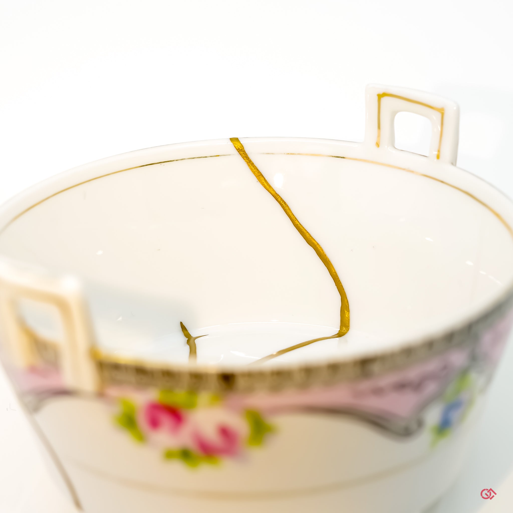 Up-close look at authentic Kintsugi pottery, highlighting intricate details.