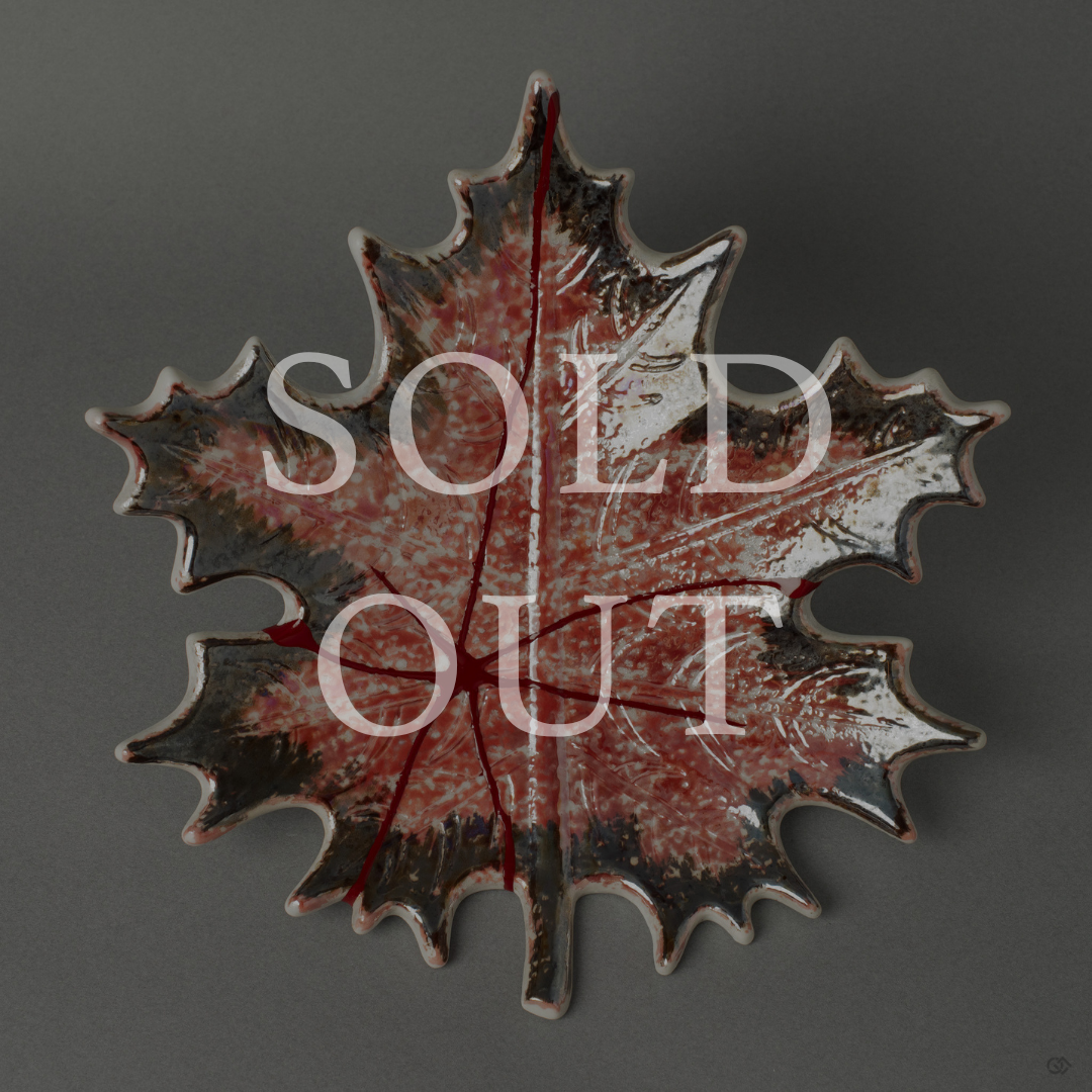 Restored maple-leaf Arita ware plate, sold out — vermilion iro-urushitsugi adorning the front and pure silver gintsugi on the reverse, restored by Nobuyasu Suginaka with natural urushi lacquer in Japan.