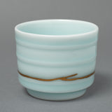 24K gold kintsugi Arita ware sake cup with celadon glaze in pale blue-green — authentic Japanese craftsmanship praised by a verified buyer from Arizona