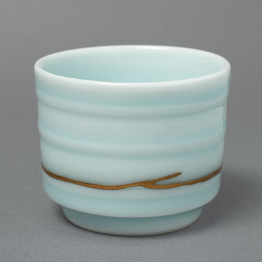 24K gold kintsugi Arita ware sake cup with celadon glaze in pale blue-green — authentic Japanese craftsmanship praised by a verified buyer from Arizona