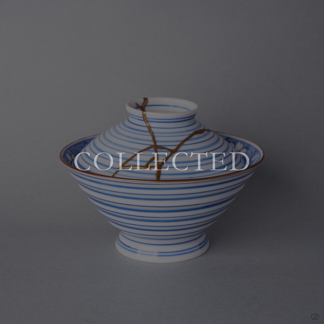 Kintsugi bowl with lid in Arita sometsuke porcelain, natural urushi and 24K gold lines descending the ringed lid, front view. Collected.