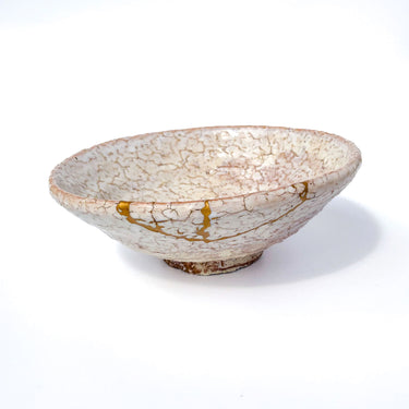 Authentic kintsugi Hagi ware matcha bowl with natural warm glaze and museum-worthy 24K gold repair — stunning vessel with excellent service, praised by a verified buyer from Utah