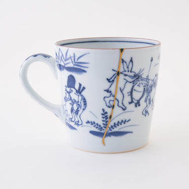 Unique kintsugi Kyoto ware mug Playing Animals with traditional figurative painting and gold repair — swift and stunning delivery, praised by a verified buyer from California.