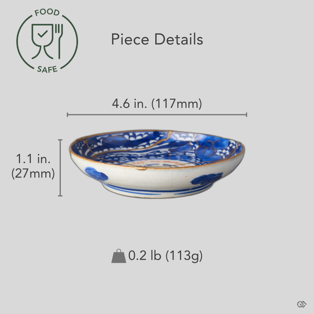 Size reference for a kintsugi plate in blue-and-white Ko-Imari porcelain restored with natural urushi and 24K gold: 117 mm wide, 27 mm tall, 113 g.