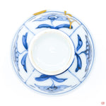 Photo of the bottom side of an authentic Kintsugi pottery piece, showing its overall design and features