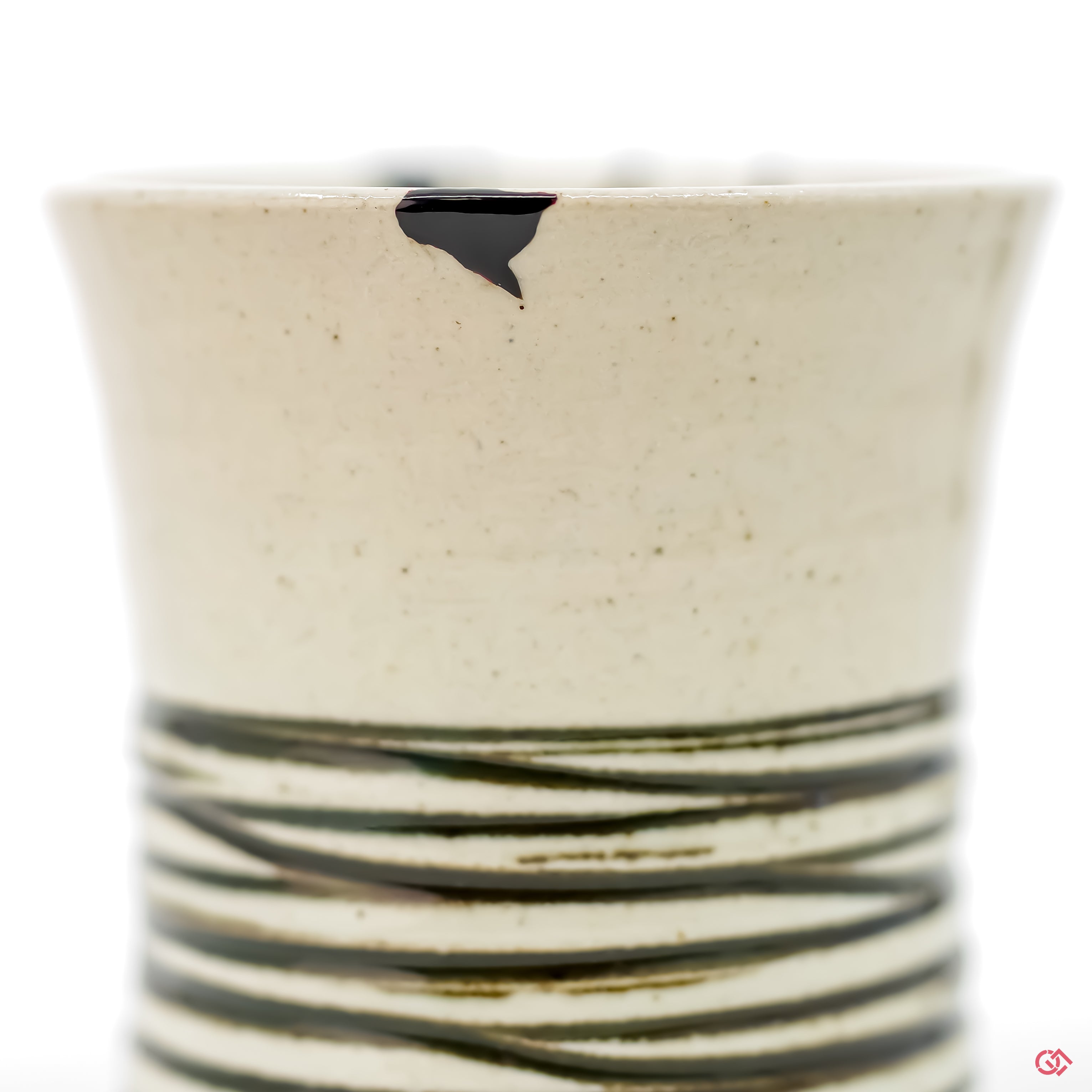 Discover the beauty of Kintsugi: Close-up of hand-repaired pottery.